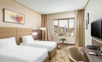 Wirgan Alnoor Hotel in Makkah – a peaceful and family-friendly hotel offering clean rooms, great hospitality, and convenient Haram shuttle services.